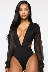 TrendyNelly™ Deep V-Neck Flare Sleeve Playsuit Romper